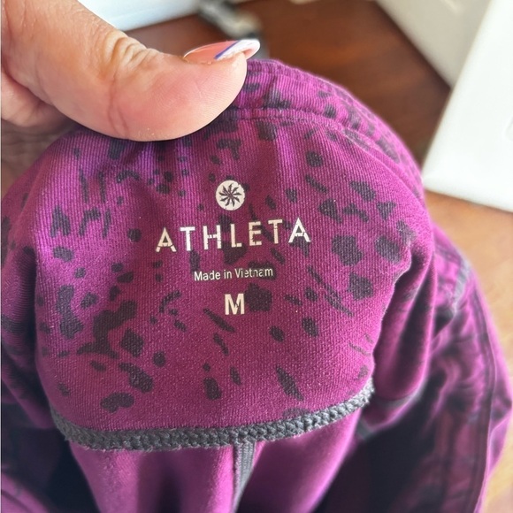 Athleta capris length women’s leggings size medium. Purple with black pattern. - Picture 9 of 10